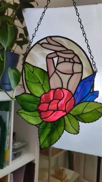 8.2K views · 149 reactions | Backlit babe! I love how glass shifts color in different lighting! The leaves and background of this piece actually SPARKLE if you catch the light but ... that cranberry pink (actually made with gold) GLOWS! #stainedglass #artprocess #etherealart | Glimpse Glass | Facebook