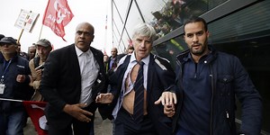 Watch Air France strikers strip airline execs half-naked during job cut protests