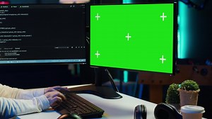 Premium stock video - Admin installing fortified code on chroma key pc to prevent cyber attacks