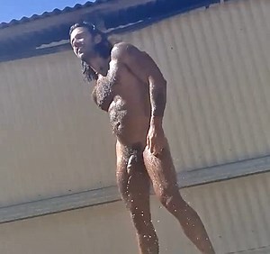 Naked in outdoor communal shower, blowjob
