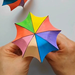 The simple and beautiful rainbow umbrella is perfect for this rainy season. In the rainy season, sow the seeds of hope and wait for the flowers to bloom. #parentchild handmade #kindergarten handmade #handmade #umbrella #origami #origamiart #art #handmade #paperart #paperfolding #paper #papercraft #origamipaper #papiroflexia #origamilove #diy #origamiartist #papercrafts #origamilovers #instaorigami #craft #origamiwork #d #design #creative #artist #paperartist #love #origamicrane #modularorigami #