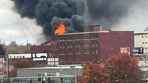 PHOTOS: Crews battle massive fire at vacant manufacturing building in downtown Canton