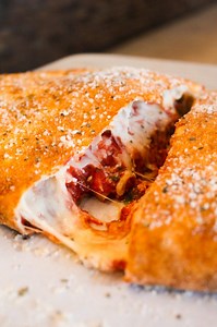 1K views · 14 reactions |  Everything's bigger in Texas! Especially our Texas-Size Calzones. Upgrade any regular calzone to Texas-Size and dig in. ﻿﻿Available online and dine-in. #papaspizza #galvestonrestaurants #galveston #galvestonfoodies #galvestonisland #lovegalveston #visitgalveston #thingstodoingalveston #loveourlocals #galvestonrestaurantgroup | Papa's Pizza | Facebook