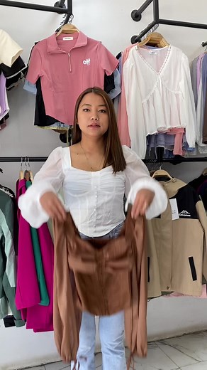 Fashion Outfit Showcase in Modern Clothing Store