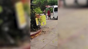 Ellesmere Port residents become local celebrities thanks to their daily efforts to get rice to hungry villagers after getting stranded in Vietnam
