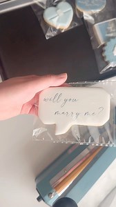 Engagement orders will always have my heart 💙 congrats to these two on their engagement!! Bags are linked on my Packaging highlight! #engagementcookies #royalicingcookies #weddingcookies #cookiepackaging | Hanamade Cookies