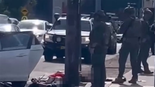 Heavily armed police swoop on Sydney street in police operation-