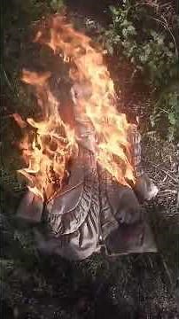 Vintage shiny nylon coat burning