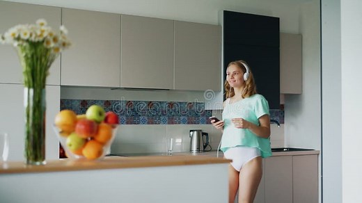 Girl in Underwear Dancing in Kitchen at Home. Happy Woman Stock Footage - Video of breakfast, eating: 124382644