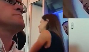 'Mile-high club' couple caught sneaking out of plane bathroom