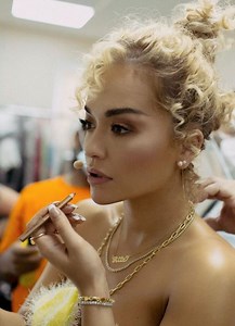 Rita Ora stuns in fluffy yellow dress in behind-the-scenes Masked Singer snaps