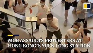 Rod-wielding mob dressed in white storms Hong Kong’s Yuen Long MTR station, attacks protesters and passers-by
