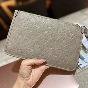 Louis Vuitton Carryall Empreinte Pouch in Turtledove