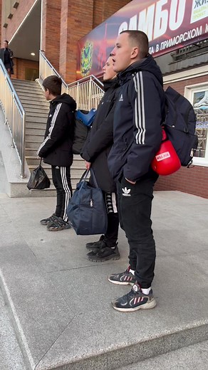 Young Athletes Gear Up for Sports Event Outside