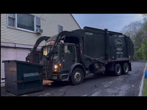 Mack MRU Wittke front loader slamming Wet dumpsters