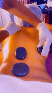 Hot Stone Massage Therapy Placing smooth, round stones on pressure points and knotted muscles all over the body before a massage helps loosen everything up and gets both your mind and body in the mood for whats to come. Hot stones are an essential ingredient to get the most out of this treatment. By placing hot stones at key points on your body before your massage begins, the massage therapist is alleviating muscle tension before they even place their hands on you, making it easier for her to gi