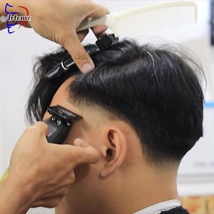 5.9K views · 70 reactions | Low taper one side comb long top Mekus mekus na insan. eheheh #filambarbershopdumaguete #artemzthebarber #haicutdumaguetecity #cutandshavedumaguete #barbershopdumaguete #dumaguetebarber #barberdumaguete #dumaguetecity | Artemz thebarber | Facebook