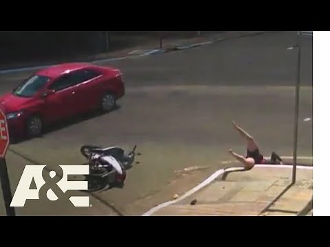 Rescue Cam: Moped Driver Crashes and Falls into Sewer | A&E