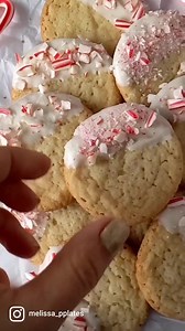 An EASY, semi-homemade cookie for your holiday cookie trays. https://www.persnicketyplates.com/easy-3-ingredient-white-chocolate-dipped-peppermint-candy-cane-cookies/ | Persnickety Plates