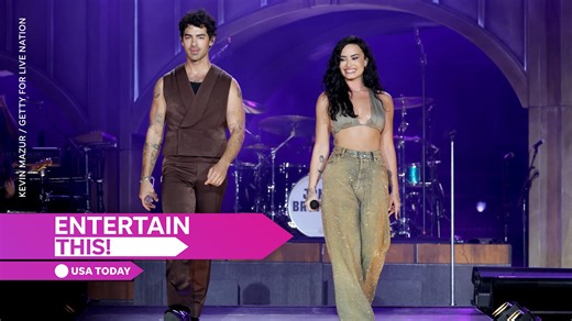 Demi Lovato performs with the Jonas Brothers on stage for a surprise 'Camp Rock' reunion