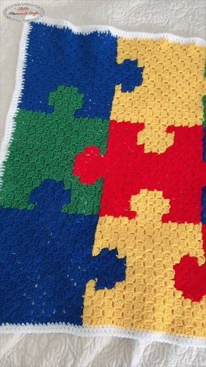 Here's a beautiful C2C pattern! It's perfect for gifting or keeping for yourself. Find the pattern here: https://www.nickishomemadecrafts.com/crochet-puzzle-c2c-blanket-pattern/ #crochet #c2c #learntocrochet #crochetblanket #blanket #puzzle #crocheting | Crochet Patterns & Tutorials by Nicki's Homemade Crafts