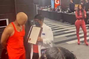 Kim reunites with Kanye backstage as ex couple laugh together at DONDA event