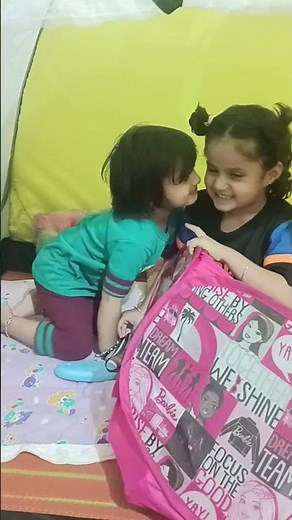 cute sisters kissing each other cutely