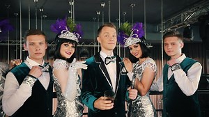 Male and female dancers in full dress at a bar - Free Stock Video