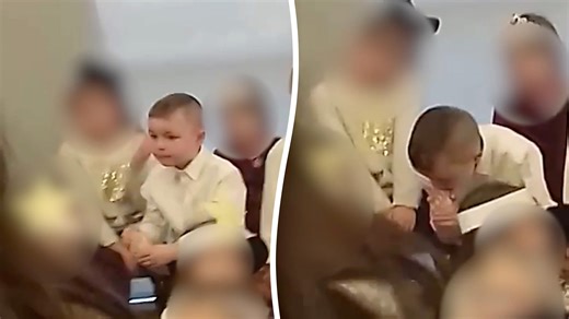 Naughty schoolboy bites his toenails - during school nativity