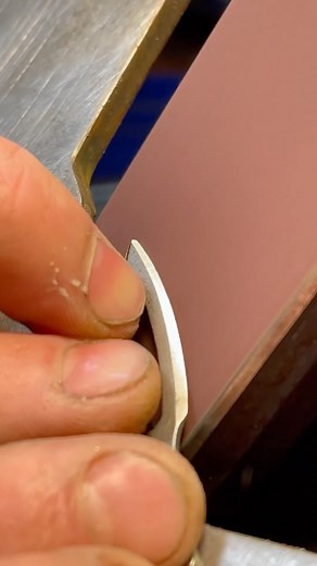 Grinding that smooth edge grind on the titanium #letteropener insert for your #KeyBar • @ameribrade #keybar #titanium #knives #knife #letteropner #edcgear #keyholder #multitool | KeyBar