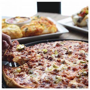 Forget the pickles? Never. At least not on our Bacon Cheeseburger Pizza. 🍔 http://bit.ly/2HIYpc0 | Home Run Inn Pizza