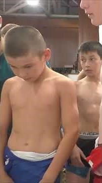 Young Russian Weight in for Wrestling Competition