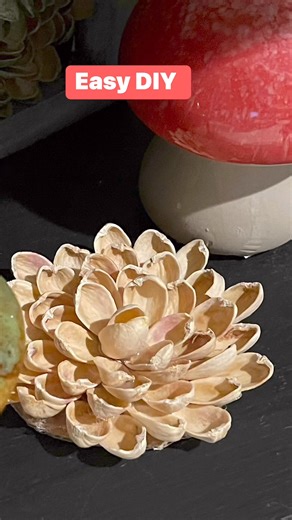 Pistachio shell flower #madebayou #madebayoucrafts #diy #diycrafts #DIYInspiration #craftylife #crafting #crafters #flowerlovers #flower #pistachios | Made Bayou
