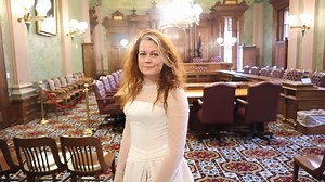 Nina is the daughter of a child bride and a survivor of forced marriage. Her dress bears the names of more than 4,000 child brides from Michigan. #EndChildMarriage | Michigan House Democrats