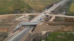 Highway overpass bridge construction progress montage. Clip