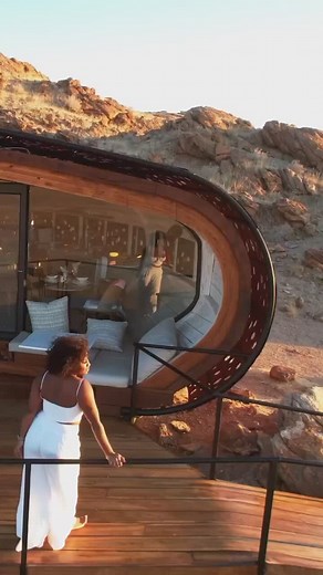 Discover serenity at Desert Whisper in the Namib Desert of Namibia—an exclusive retreat for couples. This design lodge, nestled among rock formations in a desert valley, is part of the Gondwana Collection. Positioned near the iconic Sossusvlei, it offers diverse activities, from hot air ballooning to hiking. 🎥 @ravennavera #DesertWhisper #NamibiaRetreat #Namibia #Namibdesert #WildlifeSafar | See Africa Today