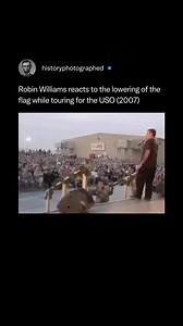 80K views · 760 reactions | Footage from Robin Williams' 2007 USO tour in Kuwait captures the moment his stand-up routine was interrupted by the military's flag-lowering ceremony. Respectfully removing his hat and pausing his act for the duration, he later eased the tension with an immediate, perfectly timed joke about the sudden interruption. | History In Pictures | Facebook