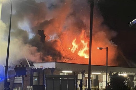 Huge fire breaks out at UK train station in early hours as smoke fills sky