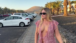girl walks down the street without panties and bra in public