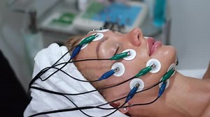 Hands Cosmetologist Myostimulation Face Woman Client Lying Bed Face Lift