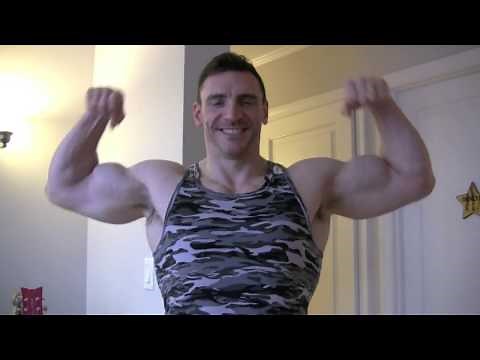 Bodybuilder Flexing and Posing Big Arms and Legs