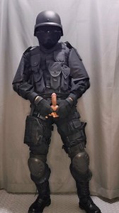 SWAT soldier having fun with cock and vibrator