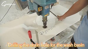 🔧✨ Precision Matters: Custom Drain Hole Drilling for Our Solid Surface Sinks! ✨🔧 At Cpingao, we ensure that every detail of your solid surface sink is perfect, right down to the drain hole! Using advanced machinery, our team professionally drills the drain hole at the exact position you need, according to your custom requirements. 💯 This precision drilling guarantees a flawless fit and optimal functionality for your bathroom setup. We take pride in our ability to cater to your specific needs 