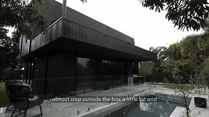 This contemporary house design brings an essence of Melbourne-inspired interiors to the Gold Coast. ⁠ ⁠ It embraces a monochromatic scheme, with sophisticated black and brushed nickel balancing natural timber and stone. ⁠ ⁠ A laser-cut staircase features as the hero piece of the home, highlighting the six-metre natural stone wall and refreshing garden bed below. ⁠ ⁠⁠ Build by: @carmichael.build⁠ Design by: @storydesigncollective⁠ Styling by: @valiantinteriors⁠ 📸 by: @abiinteriors | ABI Interior