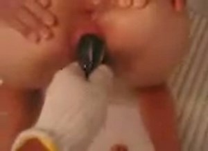 Insane animal insertion movie features a bent over Asian hoe being stuffed with live eels