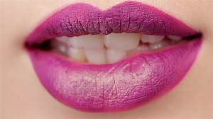 Pretty woman bites her lip