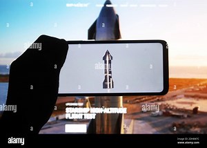 In this photo illustration, the launch of a starship SN8 prototype rocket of SpaceX at the company Boca Chica seen on a fragment of a youtube video displayed on a smartphone Stock Photo - Alamy