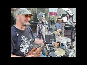 Rob Berry Busking CBG and Harmonica with Skeleton Drummer