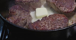 Steaks Searing in a Cast Iron Skillet with Melting Butter Stock Footage - Video of cooking, meat: 431163660