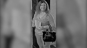 Woman dubbed serial 'wedding crasher' by police after stealing gifts